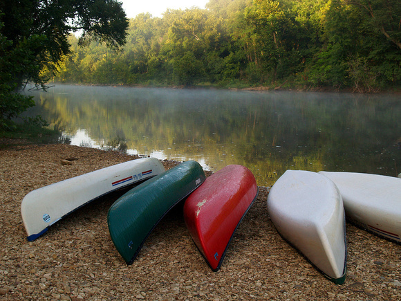 Canoes lined up at sunrise